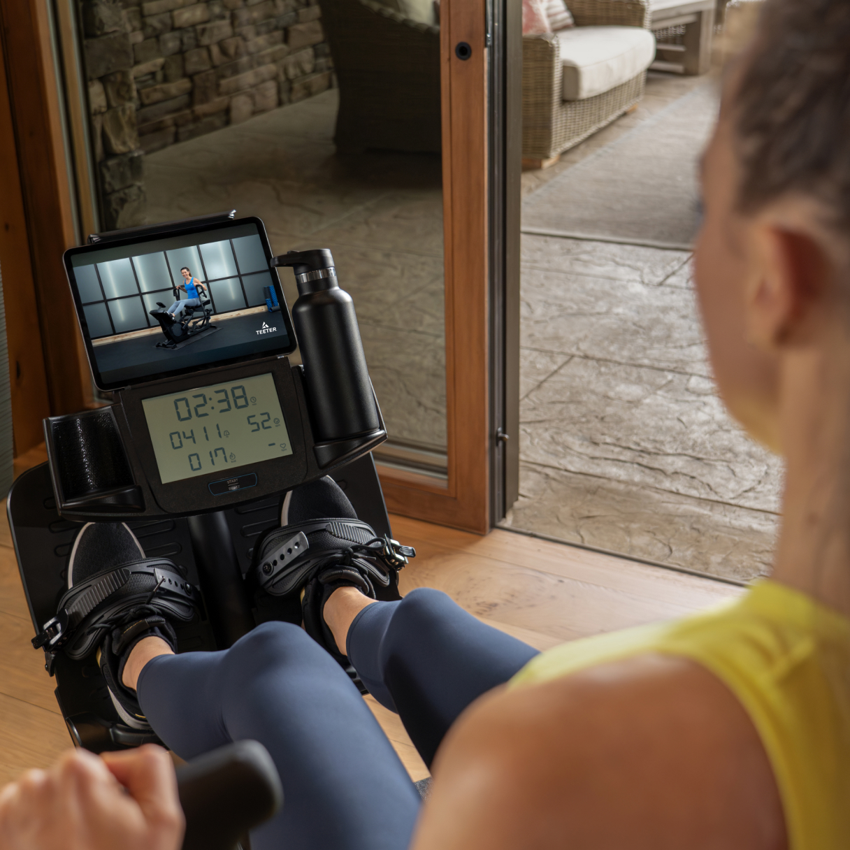 Person using the Teeter Power10 Max Console