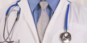 Doctor jacket and stethoscope.