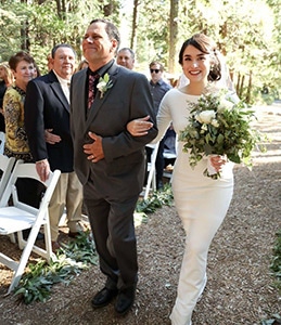 Horace walking daughter at wedding
