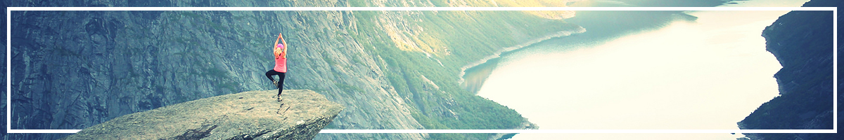 Yoga on top of a cliff