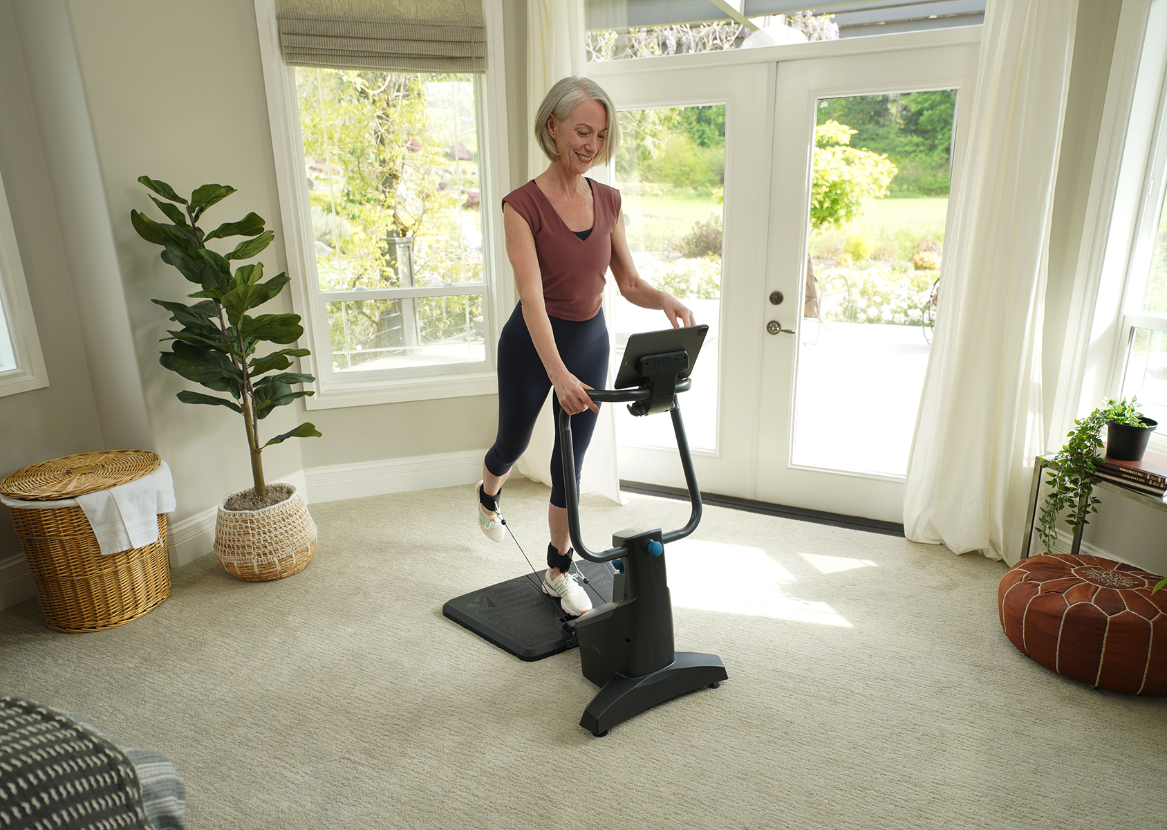 Woman on FitForm using a tablet