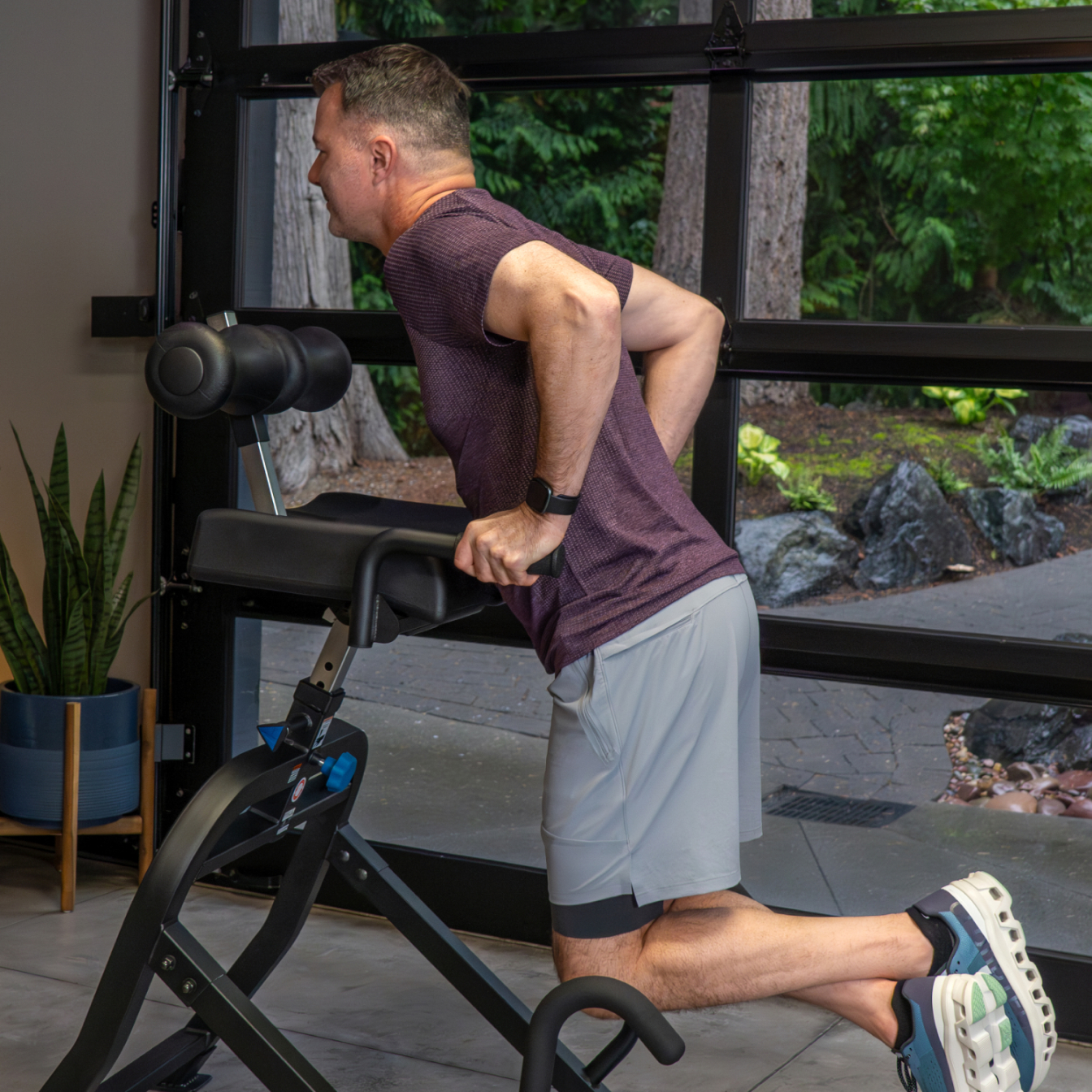 Person using DEX II in gym for workout