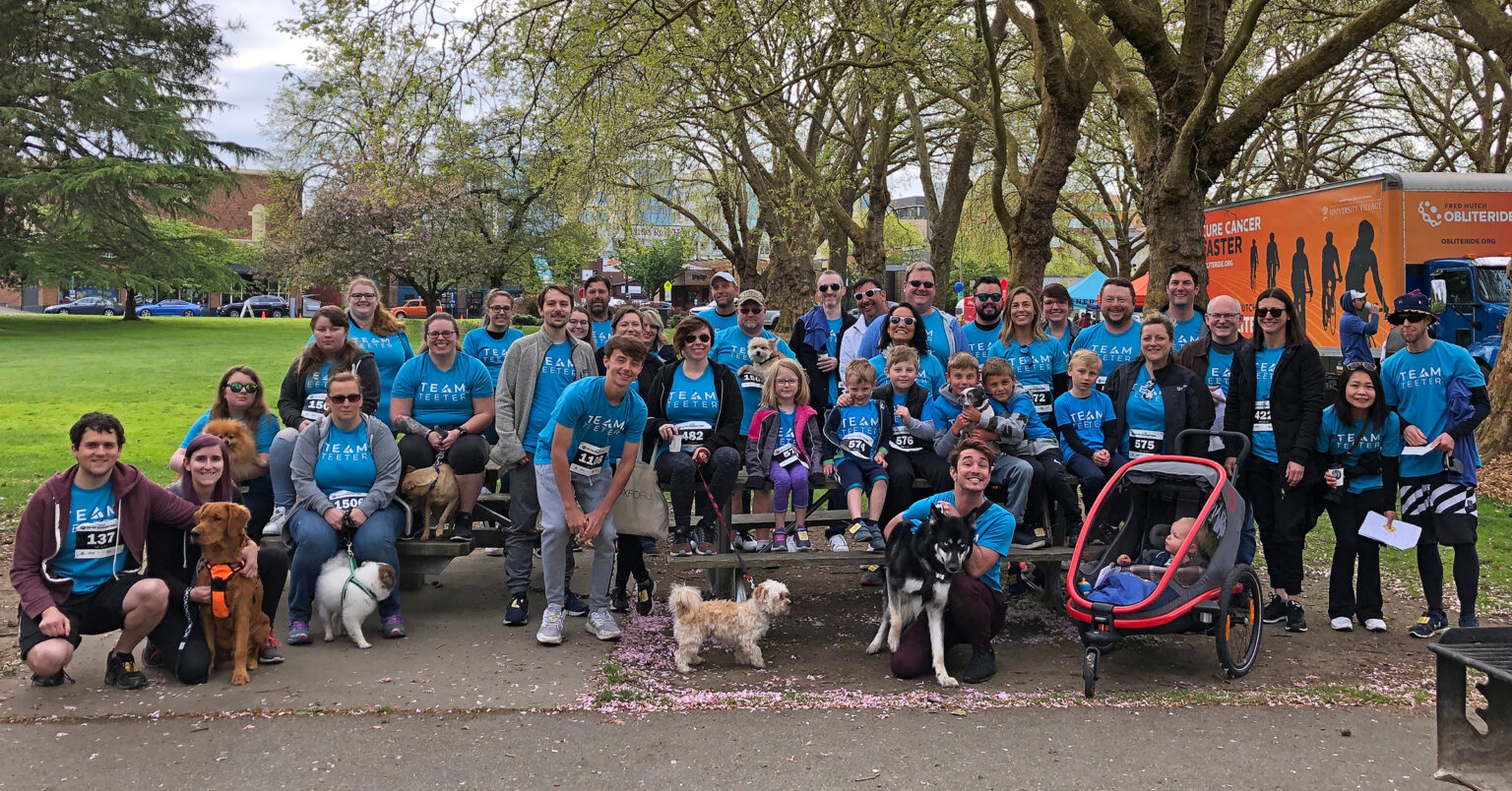 Team Teeter members and their families gathered together at an outdoor community event